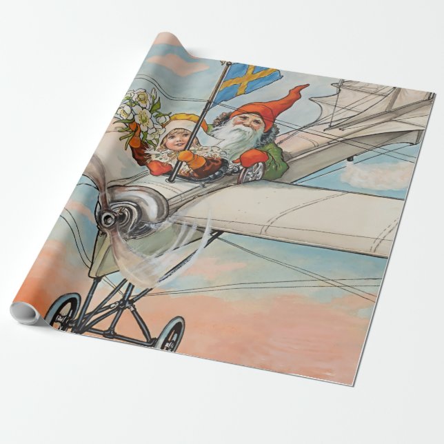 Papel De Presente “O Avião de Natal” por Jenny Nystrom (Desenrolado)