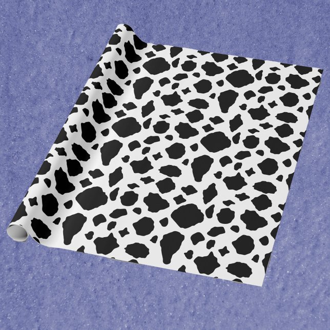 Papel De Presente Padrão de Impressão de Vaca Preto e Branco (A wrapping paper with a black and white cow print.)