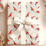 Papel De Presente Padrão de Natal do Santa Hats<br><div class="desc">Este charmoso papel de embrulho de Natal mostra um padrão divertido de chapéus de Papai Noel, perfeito para trazer alegria festiva aos seus presentes. Os chapéus vermelho e branco brilhantes se destacam contra o pano de fundo, fazer uma escolha encantadora para embrulhar presentes durante o feriado. Ideal para espalhar alegria...</div>