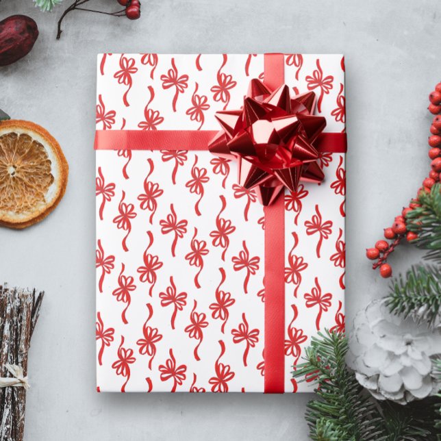 Papel De Presente Padrão de Natal para Arcos de Loopy Ilustrados (white Christmas holiday gift wrapping paper with a pattern of red looping bows)