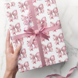 Papel De Presente Padrão do Arco rosa-rosado coquetel-claro<br><div class="desc">Papel de enrolamento do Arco rosa embebido em água. Adicione um toque de charme aos seus presentes com este papel de empacotamento simples e giro que apresenta um padrão de arco de cor-de-água cor-de-rosa-pincel. Seu design pré-disquete e bonito é perfeito para chás de fraldas, chás de panela ou aniversários —...</div>