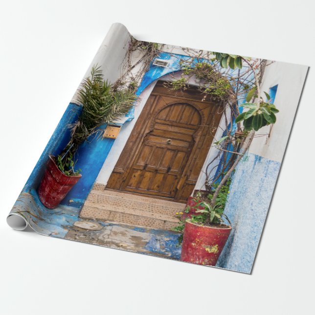 PAPEL DE PRESENTE PLANTA DE CABEÇA VERDE PERTO DA PAREDE (Desenrolado)