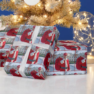 Papel De Presente Salto do Papai Noel com saco vermelho