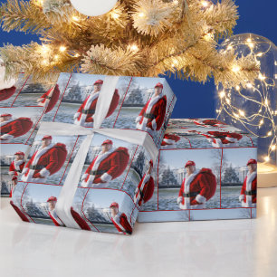 Papel De Presente Salto do Papai Noel com saco vermelho