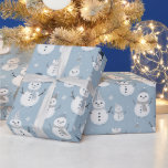 Papel De Presente Snowmen Snowflakes Blue Modern Christmas<br><div class="desc">Dê aos seus presentes de Natal um toque festivo e gelado com este charmoso papel de embrulho de Natal de cinza azul. O fundo macio e elegante cria uma canvas de vinho para o padrão brincalhão de homens de neve vestidos de adoráveis chapéus e cachecóis. Cada boneco de neve traz...</div>