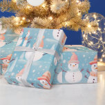 Papel De Presente Snowmen Snowflakes Blue Modern Christmas<br><div class="desc">Adicione um toque de charme gelado aos seus presentes de Natal com este delicioso papel de embrulho de Natal azul-gelo. O fundo azul-sereno de gelo cria uma terra maravilhosa, realçando perfeitamente o padrão alegre de homens de neve vestidos com chapéus e cachecóis aconchegantes. Seus designs brincalhões trazem um senso de...</div>