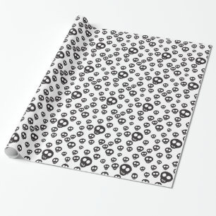 Papel De Presente Teste padrão com os crânios pretos no branco