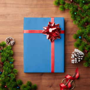 Papel De Presente um fundo azul com um relógio preto e branco