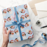 Papel De Presente Vintage Victorian Natal Santa Claus Blue<br><div class="desc">O papel de embrulho de Natal vitoriano Vintage apresenta um bonito fundo azul claro com um tradicional e sorridente Natal Padre vestindo um chapéu vermelho para o padrão da cabeça do Papai Noel. Uma elegante e vitoriosa estética de Natal vitoriana para seu embrulho de Natal, presentes de Natal e embrulho...</div>