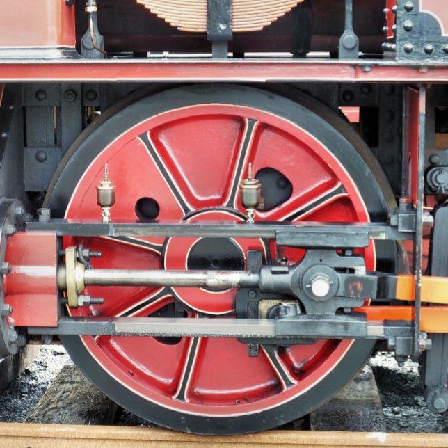 PAPEL DE SEDA COMBOIO A VAPOR (A photographic design of the wheel from a steam train.)