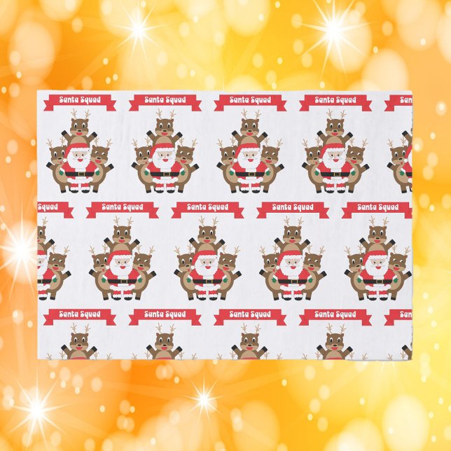 Papel De Seda Papais noeis Engraçados no Natal (Tissue paper with a pattern featuring Santa & his reindeer with a banner that says Santa Squad.)
