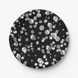 Papel Pontos polka dourados em um fundo preto . prato de