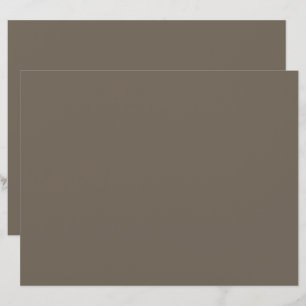 Papel Timbrado uma parede marrom com um relógio preto e branco