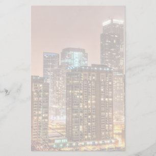 Papelaria A neve cai sobre a skyline na noite em Chicago