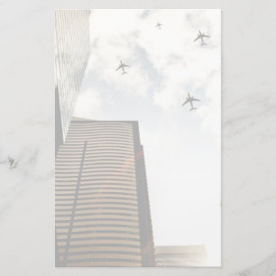 Papelaria Aviões sobrevoando edifícios