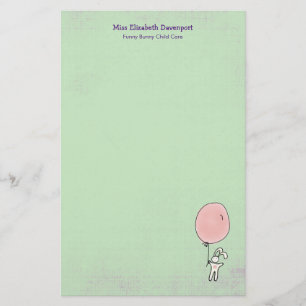 Papelaria Coelhinho bonito segurando um balão