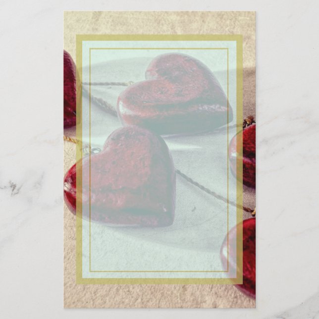 Papelaria Corações de madeira vermelhos amarrados junto em (Frente)