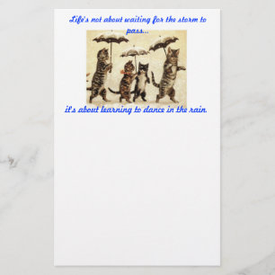 Papelaria gatos com os guarda-chuvas no papel de carta da