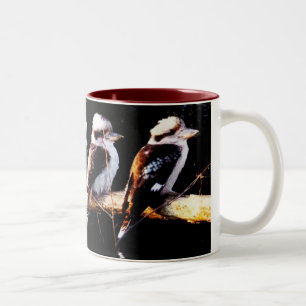 Pássaro de Kookaburra que recolhe a caneca