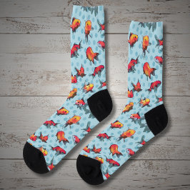 Peixes vermelhos e amarelos de fundo azul