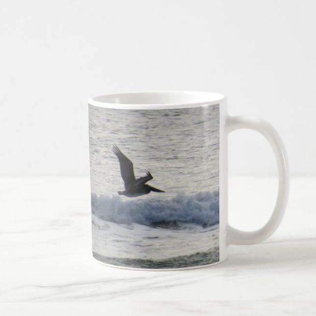 Pelicano na caneca de café do crepúsculo (Direita)