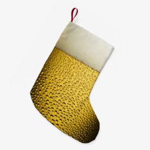 Pequena Feche ACIMA da meia do Natal do vidro de cerveja