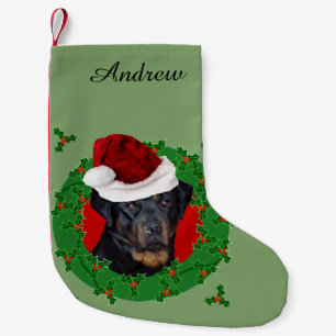 Pequena Meia do Natal do cão de Rottweiler