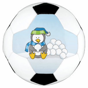 Pequeno pinguim sentado com bolas de neve
