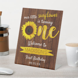 Pequeno primeiro aniversario de girassol bem-vindo