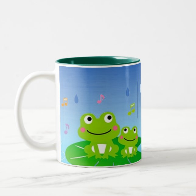 Pequenos sapos bonitos e felizes, caneca de café c (Esquerda)