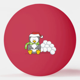 Pinguim de Natal sentado com bolas de neve