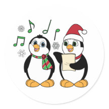 Pinguins de resfriamento no adesivo de neve
