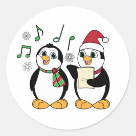 Pinguins de resfriamento no adesivo de neve