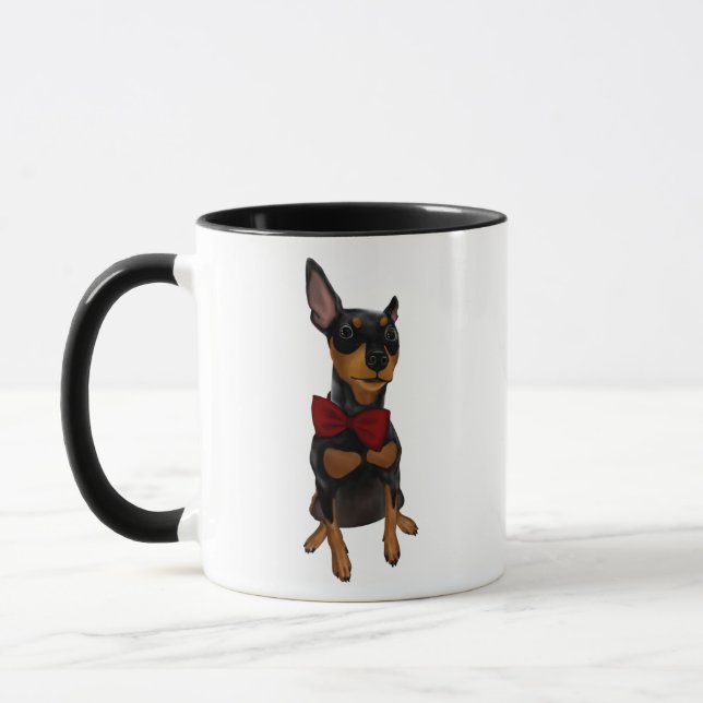 Pinscher diminuto (Pin do minuto) com a caneca de (Esquerda)