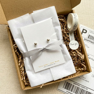 Placa de exibição de brinco de ouro e branco muito