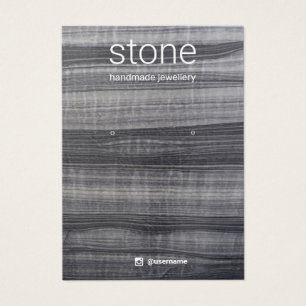 Placa de exibição de joias com anel branco preto