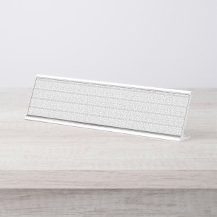 Placa De Mesa Um padrão geométrico branco e cinza preenche a ima