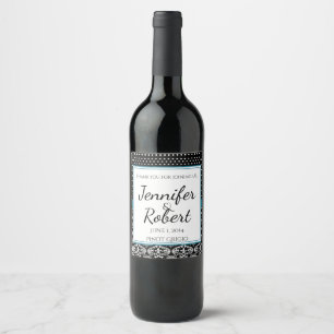Pontos e etiqueta brancos pretos do vinho do