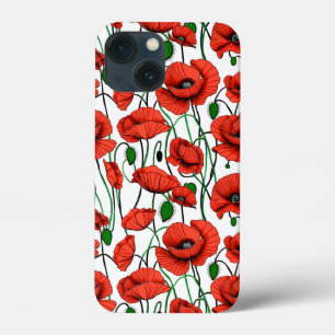 Poppies vermelhos num campo de branco
