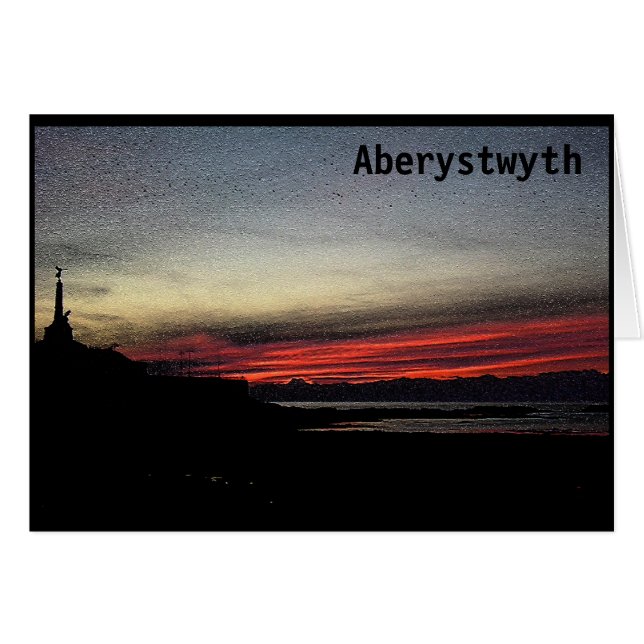 Por do sol sobre o mar no cartão de Aberystwyth (Frente Horizontal)