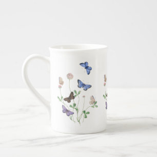 Porcelana Borboletas da caneca de China de osso de Grâ
