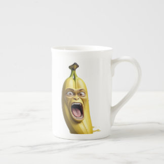 Porcelana caneca de banana cara irritada