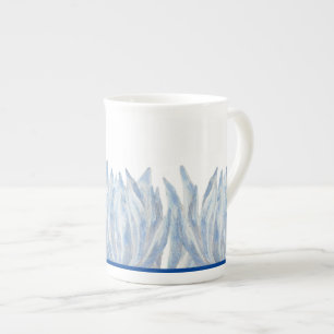 Porcelana Palitos de giz azul em uma caneca chinesa óssea