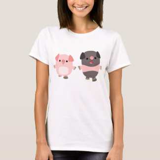 Porcos bonitos dos desenhos animados em um t-shirt