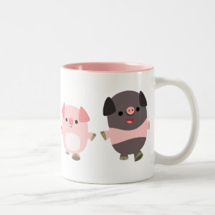 Porcos bonitos dos desenhos animados em uma caneca