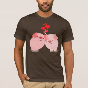 Porcos bonitos dos desenhos animados no t-shirt do
