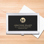 Porta Cartao Monograma Dourado Metálico preto moderno escovado<br><div class="desc">Elevem sua aparência profissional com este na moda e cartão de visita prático. Apresentando um medalhão de monograma escovado com sua empresa e título em tipografia de blocos clássicos, este caso é uma forma excelente de manter seus cartões de visitas organizados e protegidos. O fundo preto adiciona um toque de...</div>