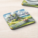 Porta-copo Cottage With View Of The Lighthouse<br><div class="desc">A dreamy coastal cottagecore landscape filled with soft watercolor charm and breezy seaside tranquility. A welcoming seaside cottage sits among lush garden paths, blooming flowers, and a bright white picket fence, creating a warm storybook atmosphere. In the distance, a tall lighthouse rises beside sparkling blue ocean waves, adding a classic...</div>