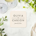 Porta-copo De Papel Quadrado Monograma de Casamento Moderno em Marfim e Preto<br><div class="desc">Cojuntos de porta-copos de casamento elegantes com os nomes do casal em tipografia preta em negrito e um e comercial em letra cursiva graciosa em um fundo de marfim quente. A data do casamento completa este design de monograma moderno e polido. Um acento sofisticado para a mesa de recepção ou...</div>