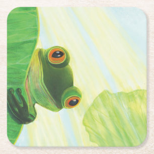 Porta-copo De Papel Quadrado O sapo verde de olhos grandes atrás da almofada de